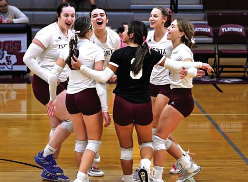 The members of the Flatonia volleyball team celebrate after a point in Tuesday’s victory over Louise. Photo by Stephanie Steinhauser