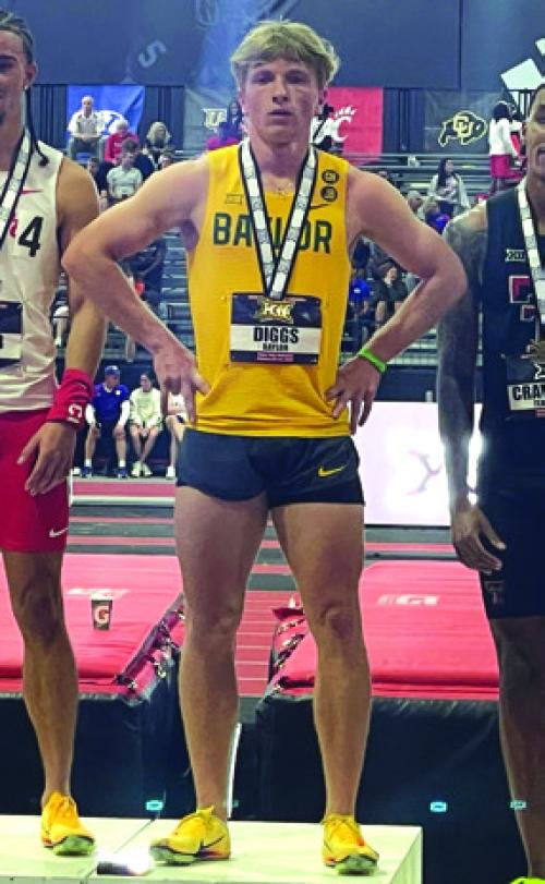Austen Diggs on the medal stand at the 2026 Big 12 Conference Indoor Track &amp; Field Championships in Lubbock.