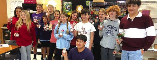 Leo Club Members Make Flower Arrangements For Care Inn Residents For Valentine’s Day