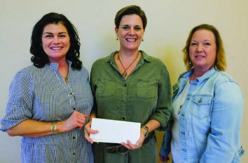 Gardenia E. Janssen Animal Shelter received a $2,000 grant from the Texas Women’s League. Pictured are Teresa Stanley-Brown (left) and Lisa Slinkard (right) with the Animal Shelter and Ashley Bishop (center) of TWL.