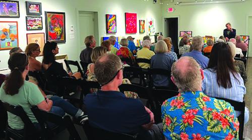 Author Joe Holley entertained the crowd at the Red &amp; White.