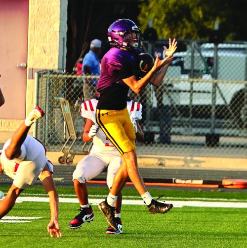 Ethan Prasek would turn this catch into the Leps’ only touchdown Friday. Photo by Darrell D. Gest
