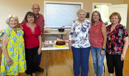 Birthday celebrants pictured left to right: Detty Danner, Phyllis Teykl, Tom Teykl, Georgia Vyvial, Vera Wehring, and Carolyn Surface.