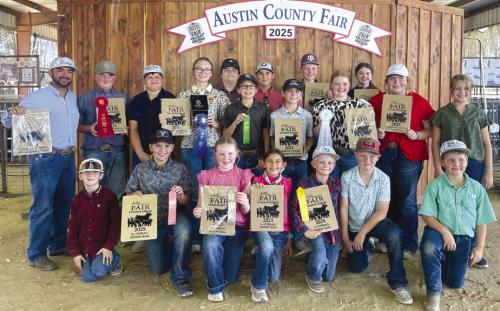 Picured front from left: Rowdy Guenther, Hudson Holub, Abigale McBride, Emma Zweschper, Joe Carrales, and Parker Gabler; back row: Coach JoJo Carrales, Abraham McBride, Hunter Gabler, Tatum Fritsch, Rilan Karisch, Tate Fritsch, Dylan Zweschper, Crockett Guenther, Holden Holub, Kaisley Janecka, Laramie Laake, Rheagan Karisch, and Hayleigh Pizzitola.