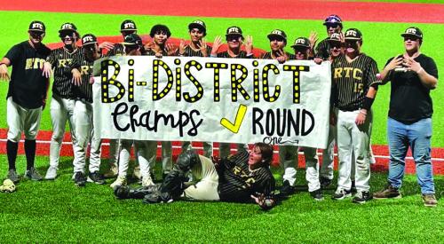 The members of the Round Top-Carmine baseball team celebrate after Thursday’s playoff sweep of Hull-Daisetta.