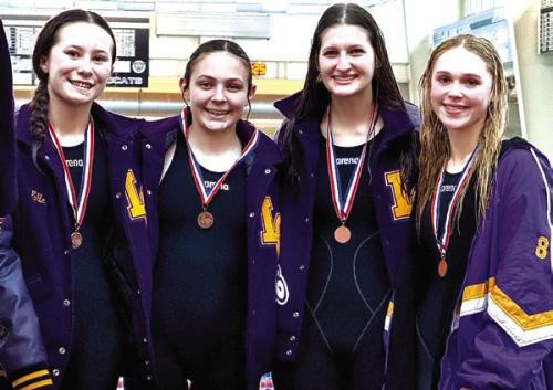 The girls’ 200 medley relay of (left to right) Eleanor Carey, Adysen Janacek, Elena Supak and Lyria Hartley, placed third while setting a new school record with a time of 2:10.79.