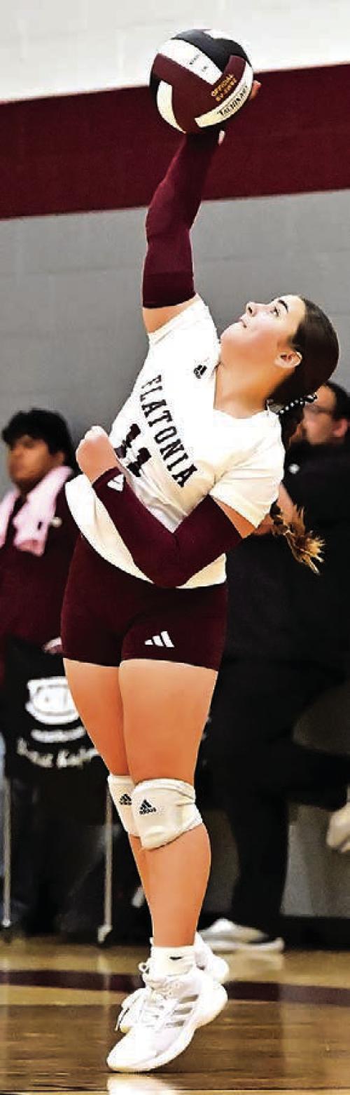 Freshman Kennedy Dornak delivers the final serve for Flatonia to pick up the winning point in the 5th set of Tuesday’s district opener versus Shiner. Photo by Stephanie Steinhauser