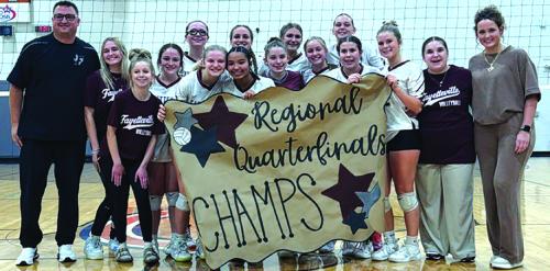 The members of the Fayetteville volleyball team celebrate their regional quarterfinal victory over Richards Thursday in Caldwell.