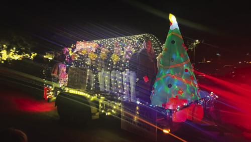 The state semifinalist Round Top-Carmie volleyball team had their own float in Saturday’s lighted Christmas parade in Round Top. Photo by Jeff Wick