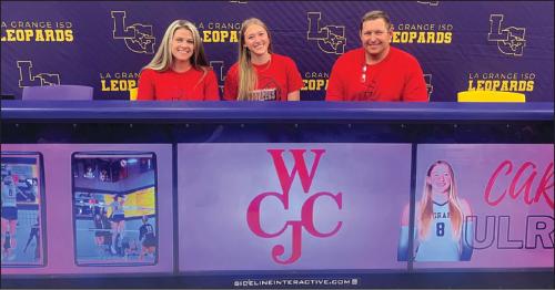 La Grange’s Carley Ulrich is shown here, center, at her signing ceremony Wednesday as she inked a deal to play volleyball for Wharton County Junior College. She is seated between her mother Amanda Ulrich and her father Chris Ulrich. Photo by Jeff Wick