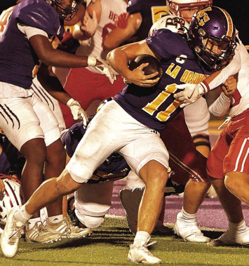 La Grange quarterback Eli Gillum runs for a touchdown two weeks ago against Bellville. Photo by Darrell D. Gest