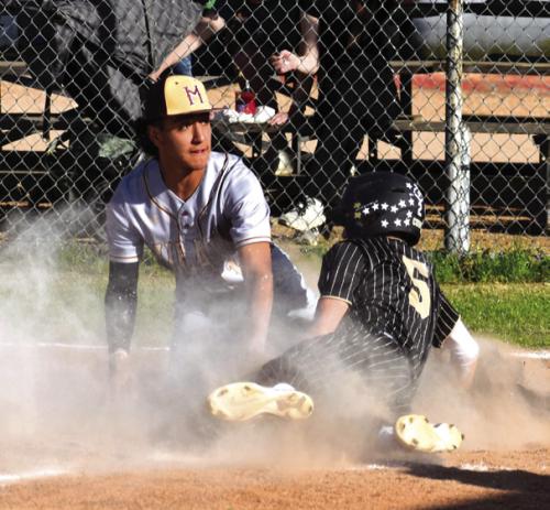 Round Top-Carmine’s William Neese slides into home plate in a cloud of dust last week against Milano. The Cubs lost to Milano Tuesday and Friday. Photo by Paul Kipp