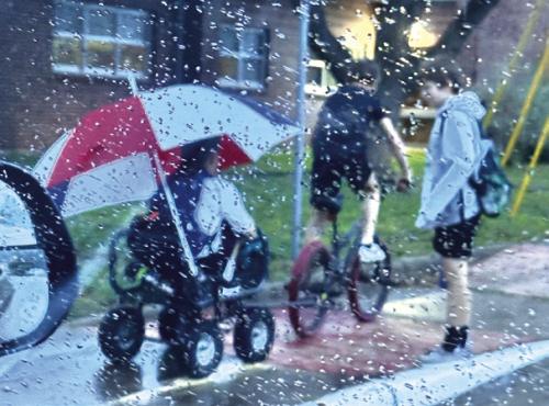 La Grange Elementary 4th grader Ace Jasek was riding his bike to school in a rain shower last week, pulling a trailer strategically placed with an umbrella to cover his backpack. Classmate Penn Wick jumped in the trailer for a dry ride as well. Even though we’ve had some showers the last couple of weeks, we’re behind on rainfall from where we normally are at this time of year.
