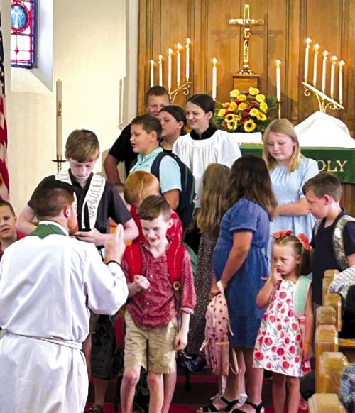Holy Cross Church Holds Backpack Blessing, Picnic Set Sept. 1
