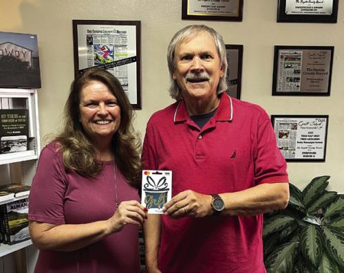 Michael Chovanec was the winner of last week’s reader football pick-it contest after correctly predicting the winners of all 10 games. He is shown here accepting his $100 gift card from Fayette County Record publisher Regina Keilers, left. The ballot appears in every Tuesday Record. Grab a copy to play.