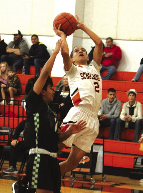 Freshman Denver Carr made his first varsity start Tuesday and the speedy guard was key to the victory over Bloomington. Photo by Jeff Wick