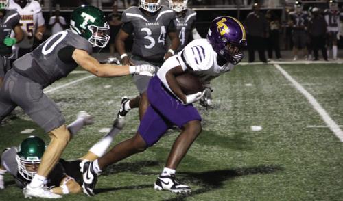 La Grange’s Dillan Johnson breaks free for yardage Friday. Photo by Hope Michalke