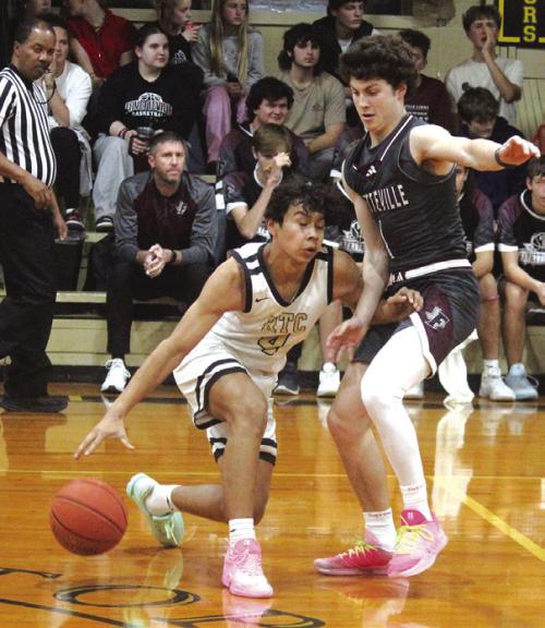 Fayetteville’s Mason Fenhaus, right, plays some tough defense against Round Top-Carmine’s Facundo Cerda Friday. Photo by Jeff Wick