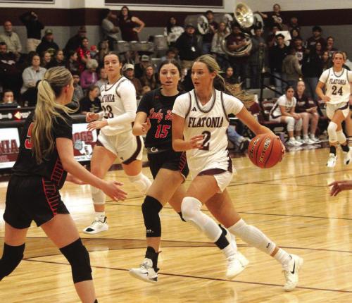 Flatonia’s Summer Sodek leads a Flatonia fast break Tuesday. Photo by Jeff Wick