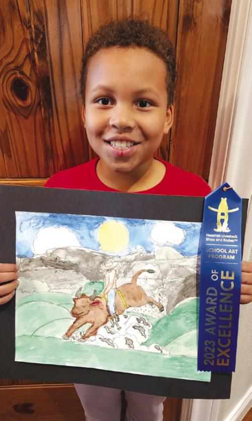 Amari Rhodes with his first place artwork from the Houston Livestock Show Art Contest.