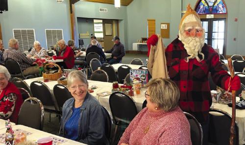 A December visit by the old German/Wendish tradition of Rumplich was included at the Holy Cross Game Day.