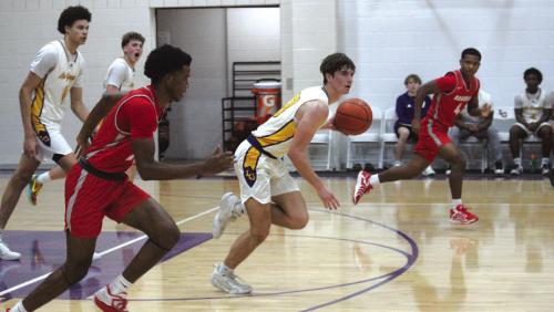 La Grange’s Mason Kleiber leads a fast-break in Tuesday’s game against Bellville. Photo by Jeff Wick