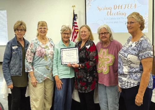 Accepting Walhalla EE 90th Year Club Award left to right: Sally Garrett, County Extension Agent-FCH; Janice Alexander, Lila Garlin, Donna Burton, Helen Wagner, Walhalla Club EE Members and Knellen Quinteros, District 11 EE Director.