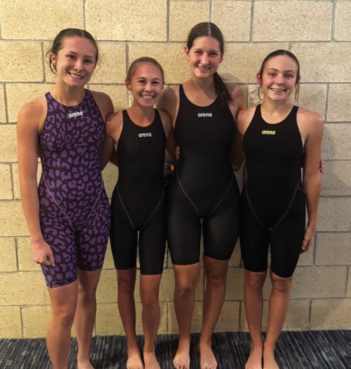 The La Grange girls’ 400 freestyle relay team of, left to right, Eleanor Carey, Lillian Carey, Elena Supak, and Adysen Janacek.