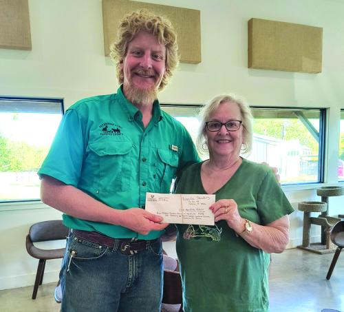 Pictured is Leonita Sanders presenting a check for $1,175 to Dr. Jeremy Finch, coordinator of Feed the Need Missions in La Grange. The offering is from the Women of the ELCA Western Cluster Fall Gathering held on Sept. 27 at Martin Luther Lutheran Church in Carmine.