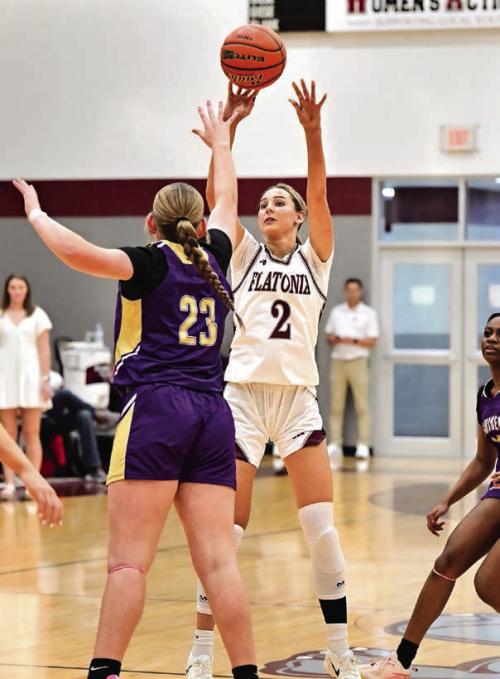 Summer Sodek puts up a 3-pointer against the Shiner Lady Comanches on Friday. The Flatonia Lady Bulldogs defeated Shiner 67-35. Photo by Stephanie Steinhauser