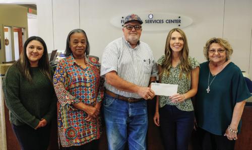Prosperity Bank in La Grange recently presented a donation to the Texas Ramp Project. Pictured are (from left) Lending Assistant Lily Rios, Banking Center Manager Peggy Pol, Texas Ramp Project Regional Coordinator J. Frank Smith, Vice President Ashley Firkins and Banking Officer Barbara Janacek. Staff photo by Andy Behlen