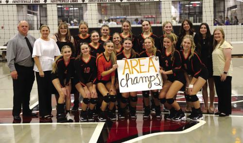 The Schulenburg volleyball team poses after their second round playoff victory Monday over Snook in Fayetteville. Photo by Audrey Kristynik