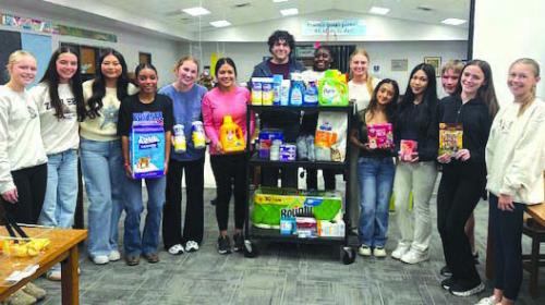 La Grange Leo Club Members Donate to Animal Shelter