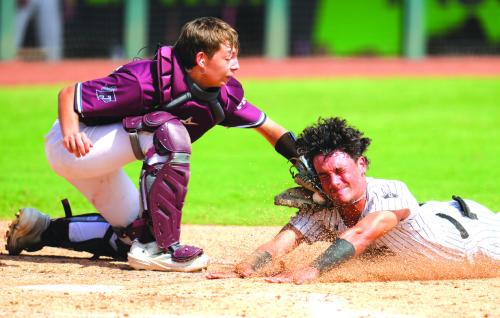 Fayetteville catcher Dylan Henneke tags out Gordon runner Brayden Walters out at home on a key play in the fourth inning of the state title game. Photo by Scott Coleman