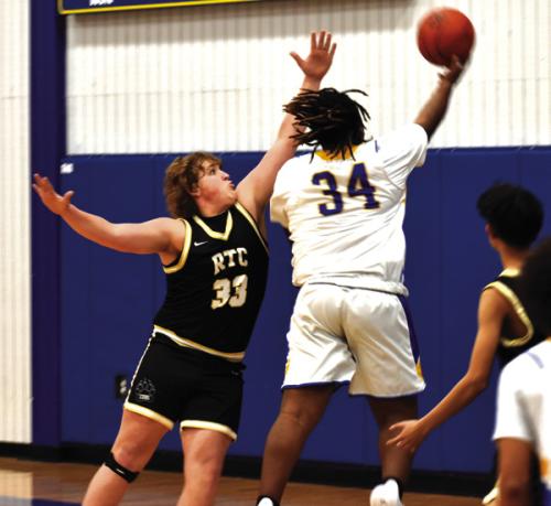 Round Top-Carmine’s Kash Wessels, left, plays defense Tuesday against Dime Box. Photo by Paul Kipp