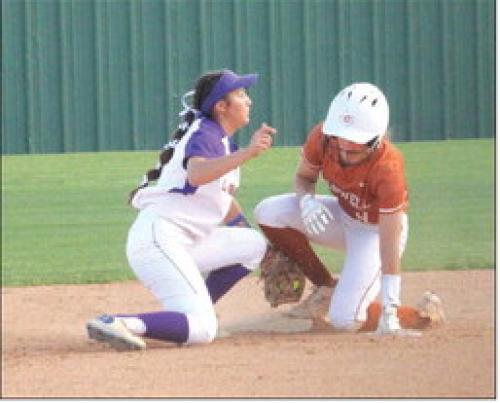 La Grange shortstop Anabella Dela Rosa tries to tag out a Caldwell runner at second. Photos by Jeff Wick