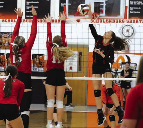 Schulenburg’s Emmrie Marx spikes a ball in Friday’s victory over Brazos. Photo by Audrey Kristynik