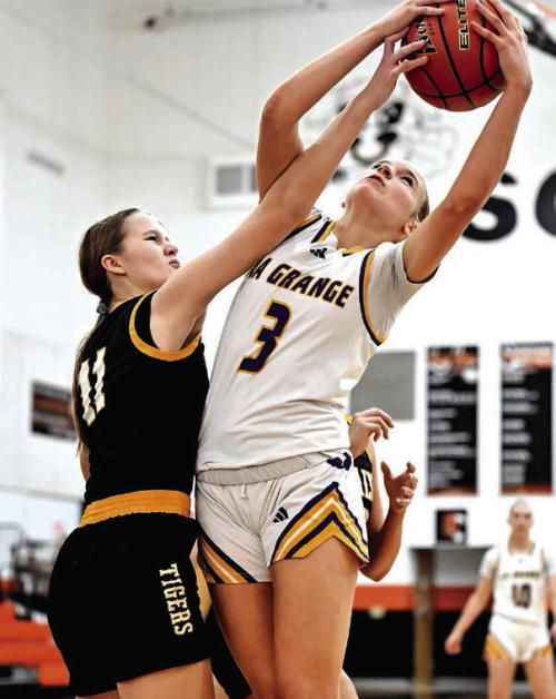 La Grange’s Avery Griffin drives to the basket in Tuesday’s game against Sealy. Photo by Stephanie Steinhauser