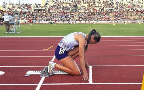 La Grange’s Macie Collier in the starting blocks for the 300 hurdles with thousands watching Thursday at UT. * Collier’s medal winning performance at state was one of the best for an LHS girl since Charline Grant won the 1981 3A 100 meter hurdle title and the 1982 3A long jump title for the Lady Leps.