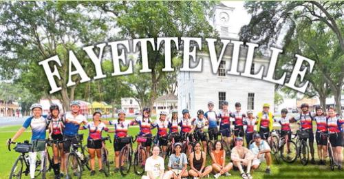 The Texas 4000 Ozark Team gathered on Fayetteville’s courthouse lawn before getting back on their journey.