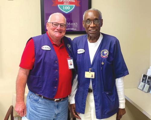 St. Mark’s Medical Center Purple Angel emergency department volunteers, (from left) Robb Muil and Felton Greer.