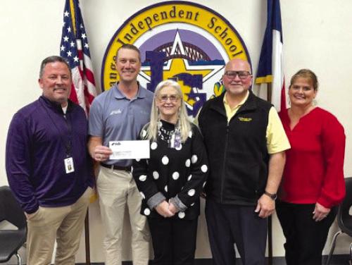 On hand as Fayette Savings Bank presented a check to La Grange ISD through its School Spirit Debit Card Program were (from left): Andy McHazlett, LGISD Superintendent; Wade Mozisek, FSB President/CEO; Diana Fitzpatrick, LGISD Director of Finance; Gary Drab, LGISD Board President; Darlene Brothers, FSB Sr. Vice President, Deposit Services.