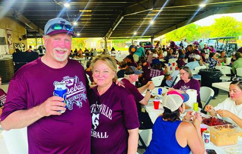Joe and Lisa Simpson (pictured above) gifted the State Championship Winning Fayetteville Lions team and their family a party truly fit for a Lion King. The Ellinger Chamber of Commerce provided their pavilion while Joe and Lisa Simpson provided enough crawfish to fill everyone’s belly. Local business owner and Lions supporter Terri McPherson supplied the championship cake (pictured below with the Fayetteville Lions Baseball Team). It was a huge turnout for a very successful and proud team.