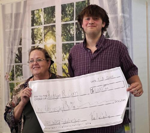 Hudson Corn receives a WACA $1,000 scholarship for the next school year where he plans to attend UTSA to study cyber-security.