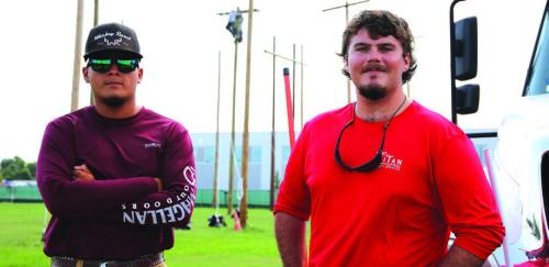 Thomas Gully, right, (a Fayetteville High School grad) and Mike Gonzales (left, of Katy), two students in Texas State Technical College’s Electrical Lineworker and Management program at the Fort Bend County campus,