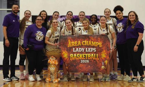 The members of the La Grange girls basketball team celebrate their Area round victory Thursday in Thrall. Photo courtesy of Amber Trlicek