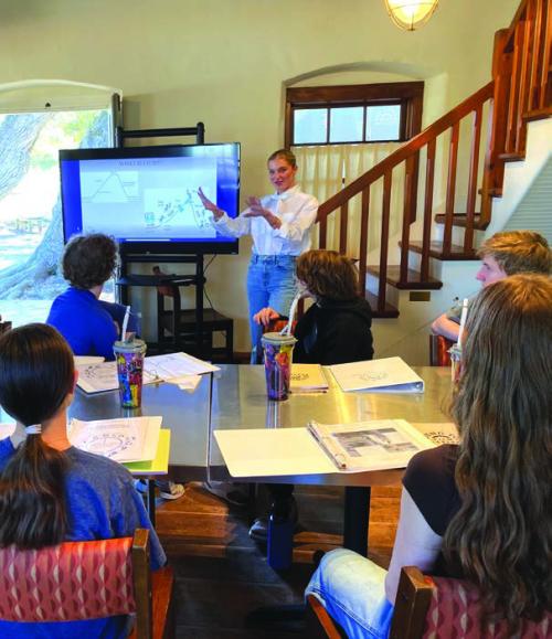 Round top Film Festival co-founder and executive Creative Produce Skylar Schanen teaches a script writing class to local students last summer.