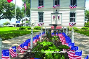 The Round Top courthouse grounds are all decked out in red, white and blue for Memorial Day weekend. Photo by Jeff Wick