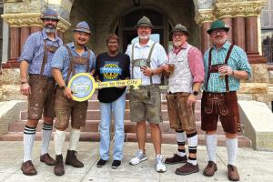 Mayor Jan Dockery presented the key to the city a group of friends who regularly return to La Grange for the annual Oktoberfest, which was held Saturday in downtown La Grange. The buddies said they already have it on their calendar for next year. Pictured here are Patrick Jumper, Matt An, Mayor Dockery, Josh Orr, Chuck Grear, and Jeff Ketzle. Photo by Regina Keilers