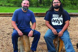 Storyteller Anthony Lira, left, and Fayette County Paranormal Society member Caleb Chowdory, right, will be part of Saturday’s festivities. Below is the campfire circle at the lake where the event will be held.